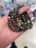 yve bracelets// dragon blood faceted beads 8mm