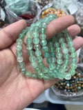yve bracelets// green fluorite faceted beads 8mm