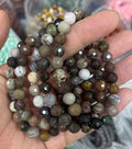 yve bracelets// petrified wood faceted beads 8mm